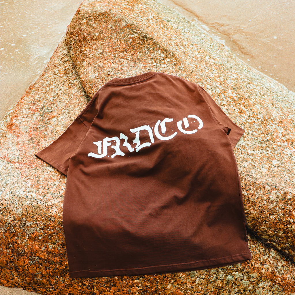 Demons Dust Bird Logo Tee Brown